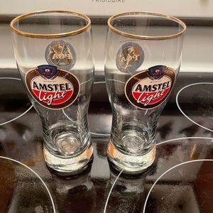2 Amstel light 16 oz glasses